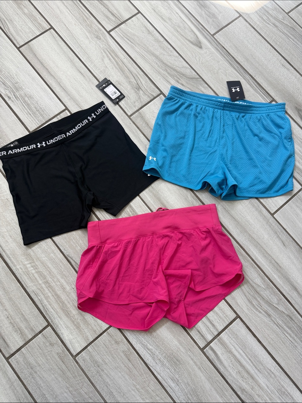 Under Armour l/xl Women’s Athletic Shorts — Black, Blue & Fuchsia